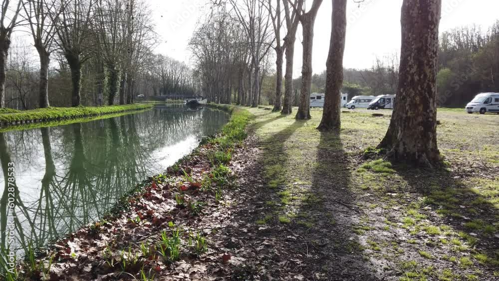 Campervan by the Canal du Midi in France in springtime. Campervan by the Canal du Midi in France in springtime.