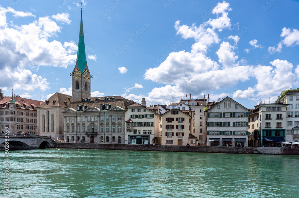 View of the historic city center with famous Fraumunster Church, on the Limmat river.