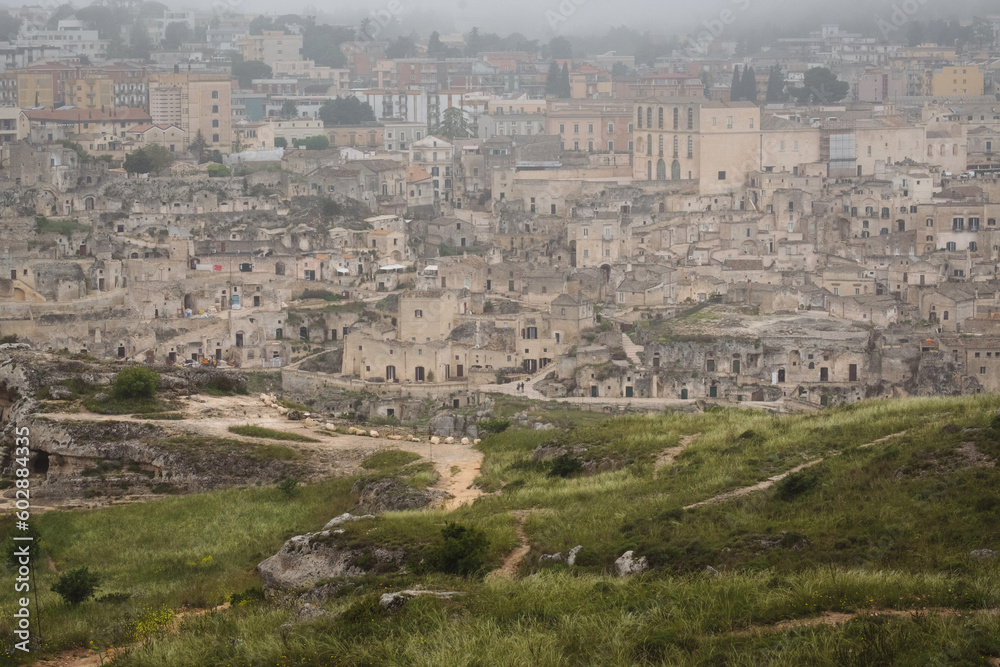 Panoramic cityscape of Matera Italy jewel of Basilicata - cave dwelling Sassi di Matera from viewpoint Belvedere of Murgia Timone