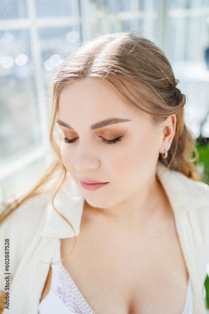Cute young woman with professional make-up and hairstyle. Cute young woman with professional make-up and hairstyle.