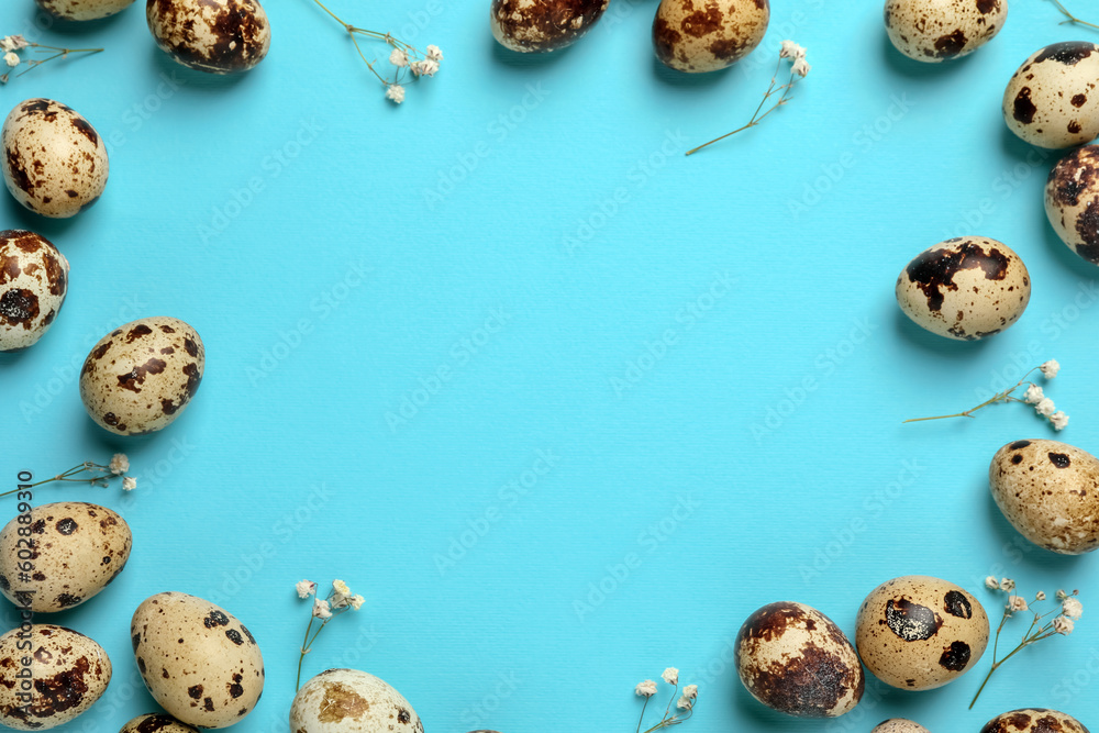 Frame made of speckled quail eggs on light blue background, flat lay. Space for text Frame made of speckled quail eggs on light blue background, flat lay. Space for text