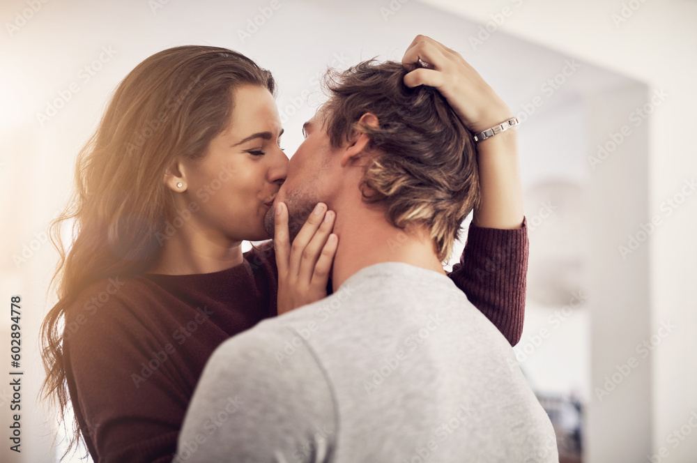 Face of happy woman, man and kiss with love in apartment for romance, intimacy and special moment together. Young couple kissing in home for romantic relationship, happiness and passionate partner - obrazy, fototapety, plakaty 