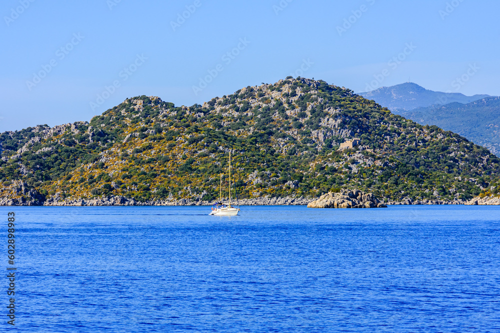 Modern luxury yacht near the shore in Mediterranean sea. Summer vacation