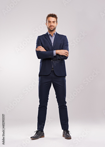 Full body portrait of business man, arms crossed with confidence isolated on studio background. Professional mindset, career success and mockup space with corporate male employee and leadership