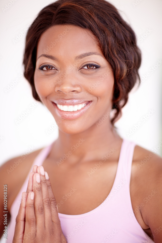 Yoga, portrait and praying hands by happy woman meditation in studio for balance or zen on white background. Prayer, pose and face of African lady meditating for spiritual, healing and peace exercise Yoga, portrait and praying hands by happy woman meditation in studio for balance or zen on white background. Prayer, pose and face of African lady meditating for spiritual, healing and peace exercise
