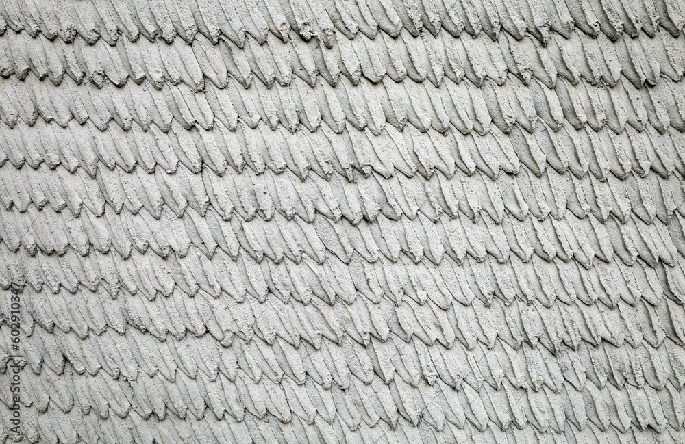 Decorative cement wall with leaves shape pattern. Background and texture Decorative cement wall with leaves shape pattern. Background and texture