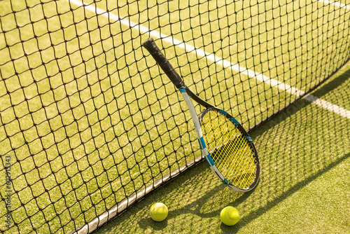 Tennis racket and balls, flat lay. Space for text