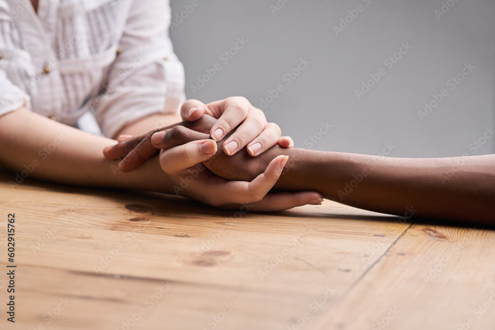 Support, forgiveness and people holding hands for empathy, love and trust. Help, table and diversity with a helping hand from life coach, care of friends and showing compassion for mental health