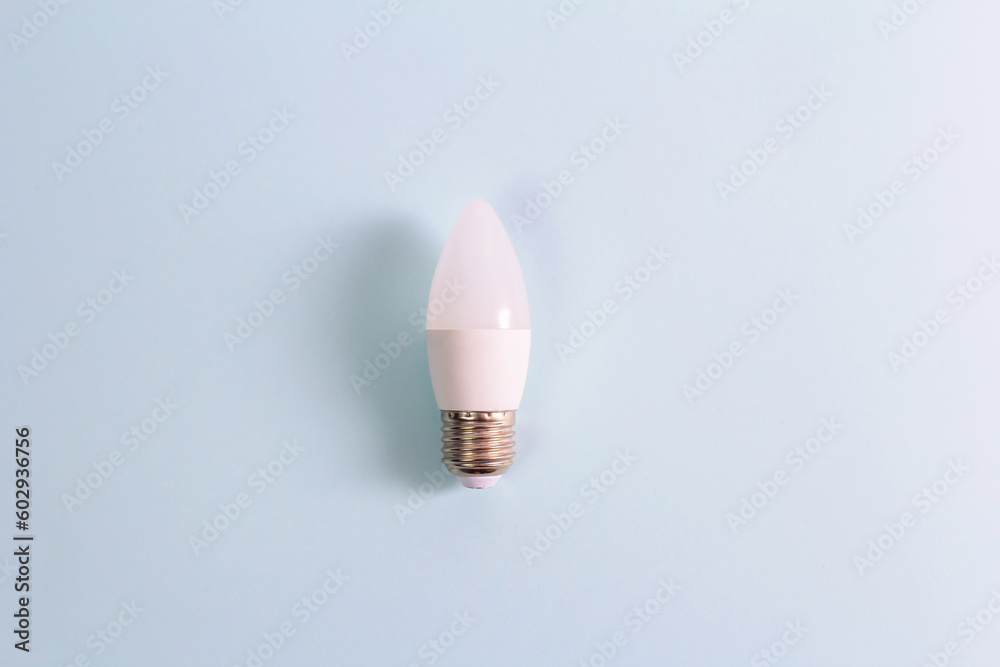 light bulb, glow plug on blue background light bulb, glow plug on blue background