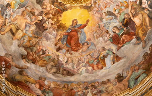 GENOVA, ITALY - MARCH 5, 2023: The fresco of Virgin Mary in the Glory from main cupola of church Chiesa del Gesu by Giovanni Battista and his brother Giovanni Carlone from 17. cent. photo