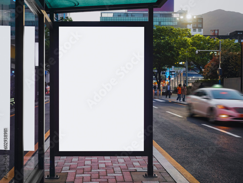 Foto Blank white mock up Media Advertisement at bus stop City street