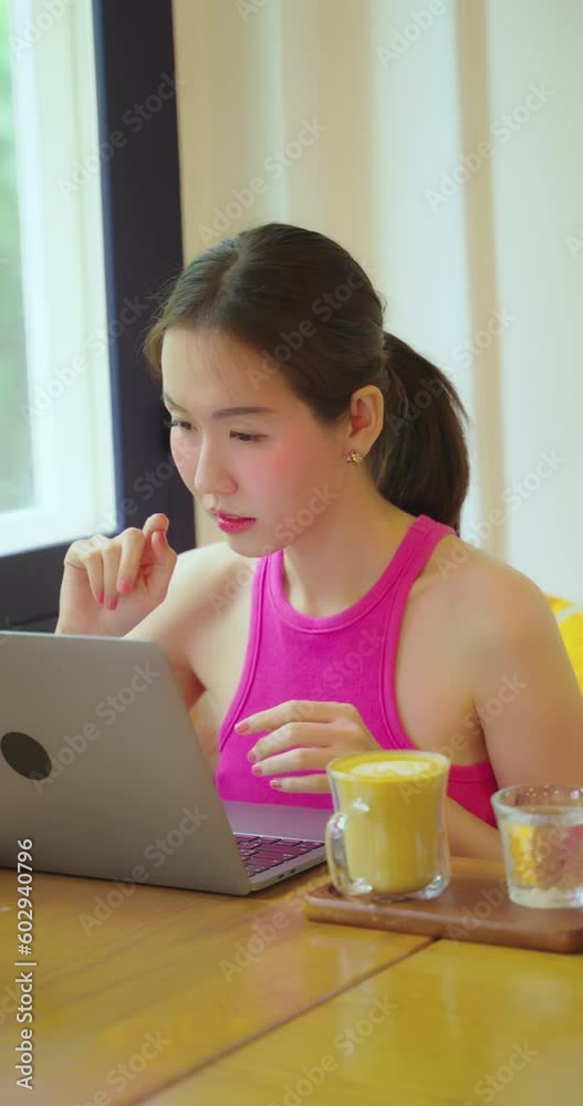 Female blogger working in restaurant. She thinking about online content or marketing. Female blogger working in restaurant. She thinking about online content or marketing.