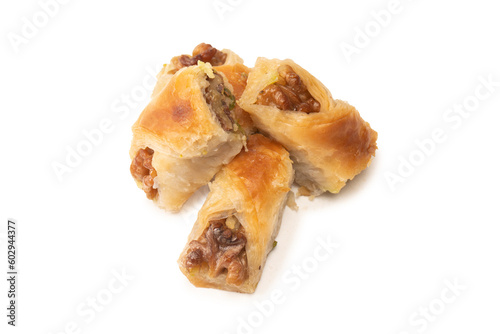 Delicious sweet baklava with walnuts isolated on white background.