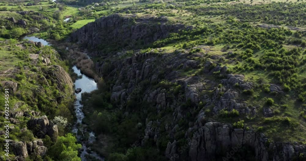 a mysterious river flows among the rocks of the canyon. Aktivskyi Canyon in Ukraine. drone view a mysterious river flows among the rocks of the canyon. Aktivskyi Canyon in Ukraine. drone view