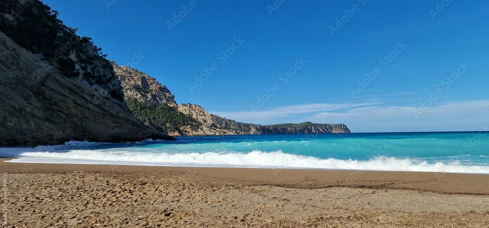 Obraz premium Coll Baix, spectacular virgin beach in the municipality of Alcudia. It is made of small pebbles and sand, difficult to access and little frequented 