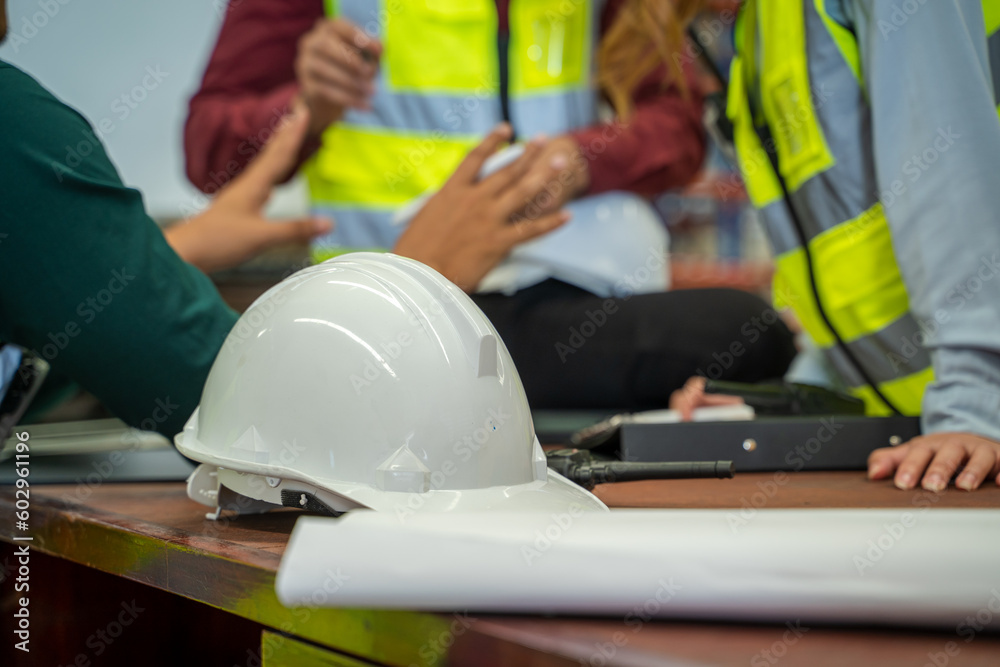 Logistics workers have a meeting in a large distribution warehouse,Logistic industry concept. Logistics workers have a meeting in a large distribution warehouse,Logistic industry concept.