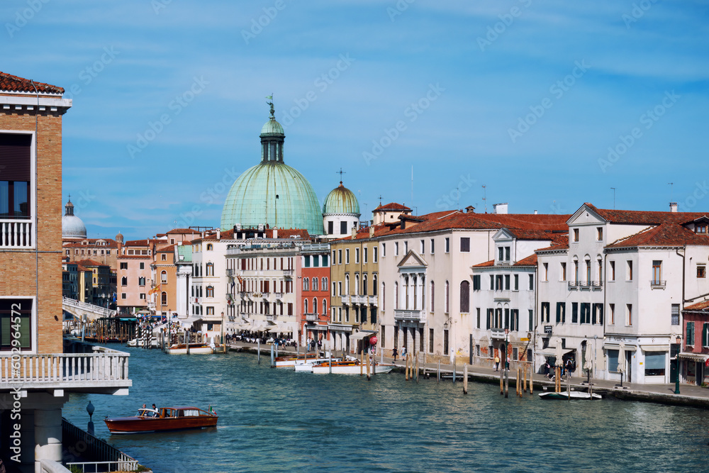 Venice Grand canal and Basilica di Santa Maria della Salute with old architecture, Italy in springtime or summer.