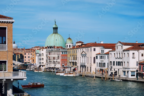 Venice Grand canal and Basilica di Santa Maria della Salute with old architecture, Italy in springtime or summer.