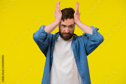 All is lost. Desperate looser yellow background. Crazy hipster feel lost. Bearded man hold head in frustration. Lost the game. Failed to win. Gambling and betting. Won some lost some photo