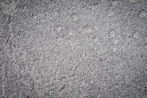 Dark grainy abstract background, texture of recycled rubber asphalt road texture, concrete