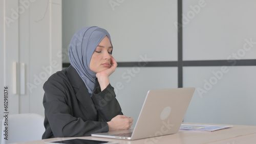 Tired Muslim Businesswoman Sleeping in Office, Need Rest