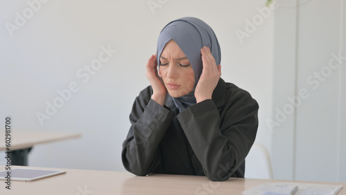 Headache, Tired Arab Businesswoman having Pain in Head