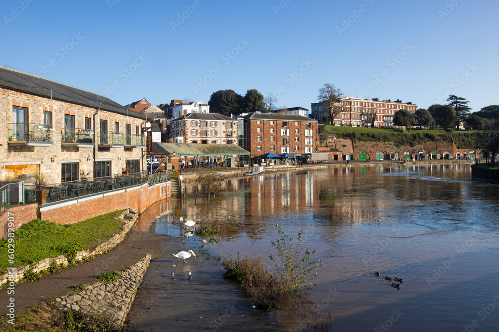 Skyline of the historic quayside of Exeter in Devon at sunrise, UK