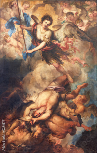 GENOVA, ITALY - MARCH 5, 2023: The painting of St. Michael archangel in the church Basilica di Santa Maria delle Vigne by Gregorio de Ferrari (1647 - 1726).
