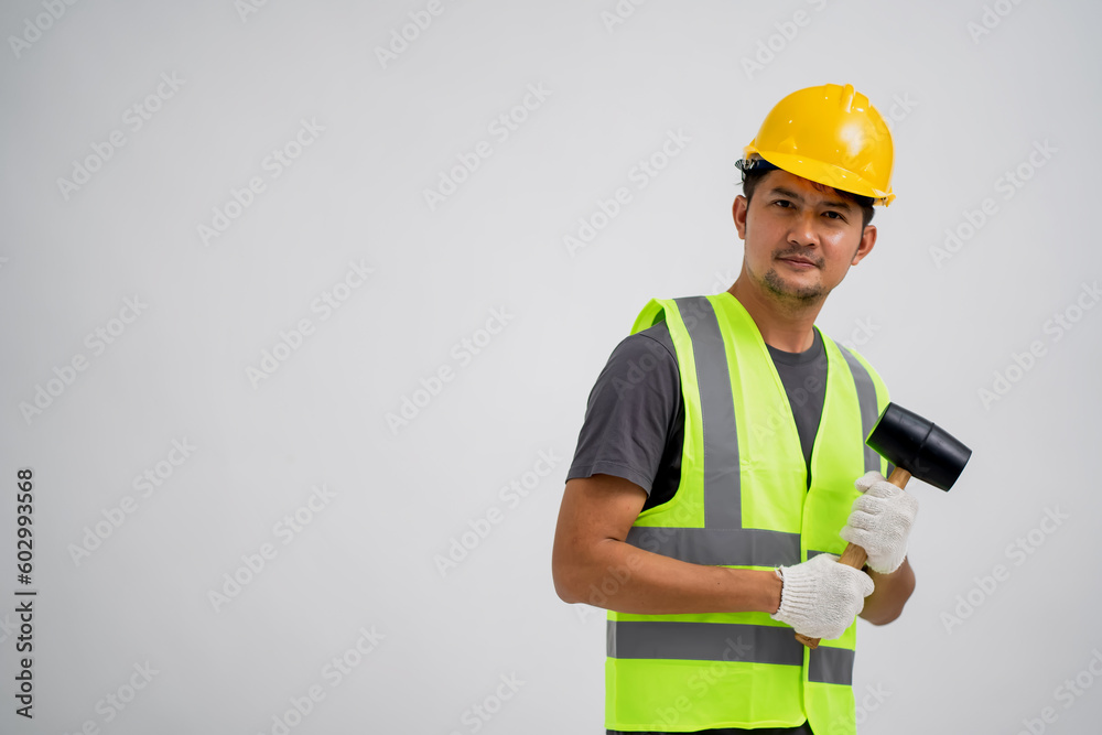 Portrait of an Asian Male Construction Worker Showing a Gesture of Work, With Isolated White Background.