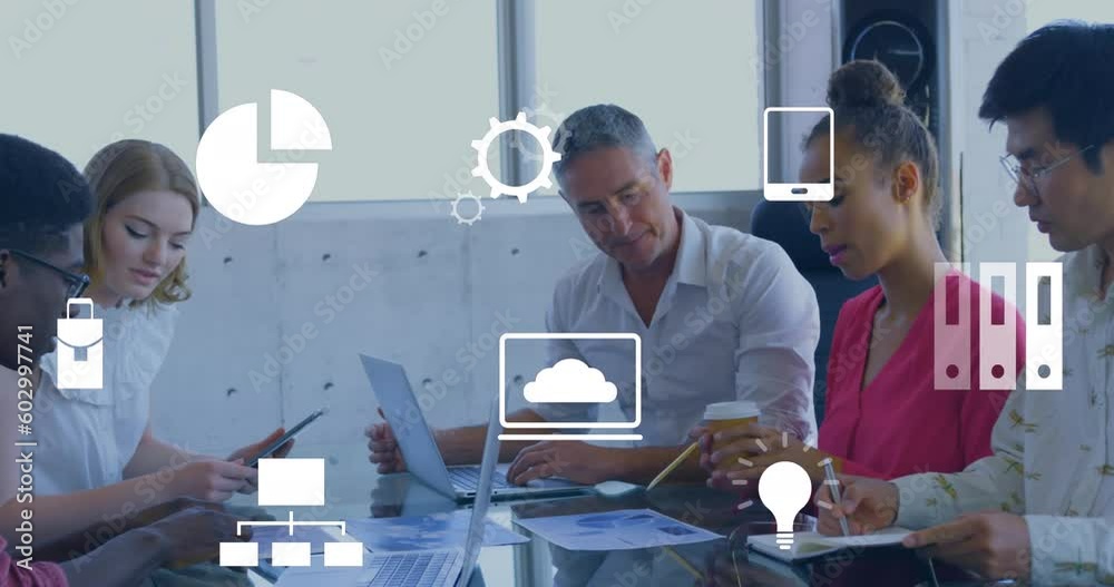 Animation of multiple digital icons against diverse team of collegues discussing together at office