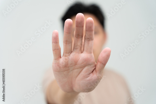 hand showing stop, insult. Pressure, sexism. Racism, stop violence expression with negative, stop taboo sign, rejecting, declining something, campaign against violence against women and children..