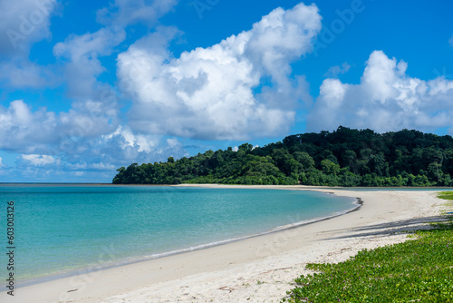 tropical beach in Andaman and Nicobar Islands, India, Asia.
The two islands Ross and Smith connected by a sandbar surrounded by crystal clear open sea waters is the aerial view of the islands.