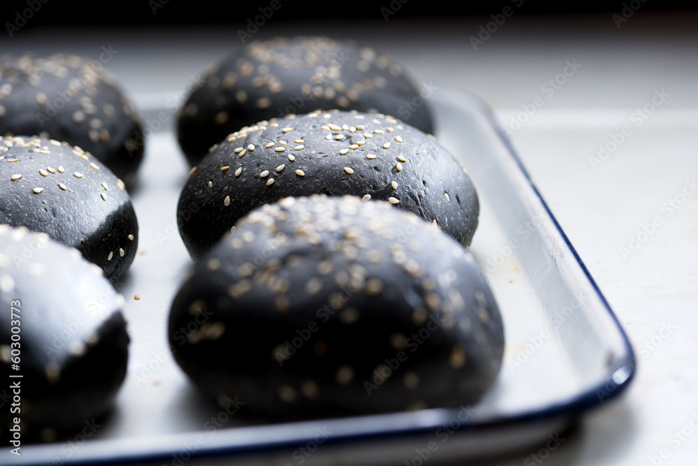 tray of charcoal buns