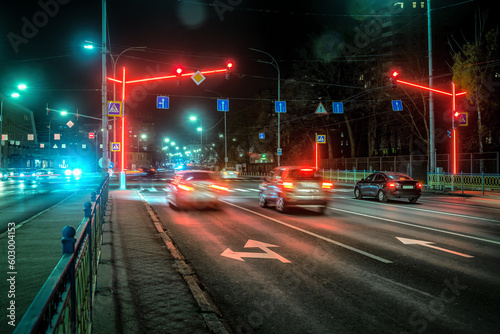 Modern Car traffic light at night city highway