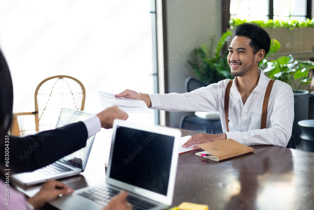 Young man employee during job interview at office workplace Young man employee during job interview at office workplace