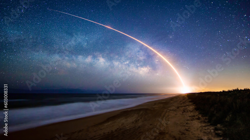 Obraz na plátne Milky Way behind a Rocket Launch from the Beach