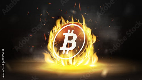 Gold bitcoin in fire flame on a dark blurred background with fog