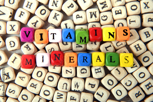 close up of the letters vitamins and minerals