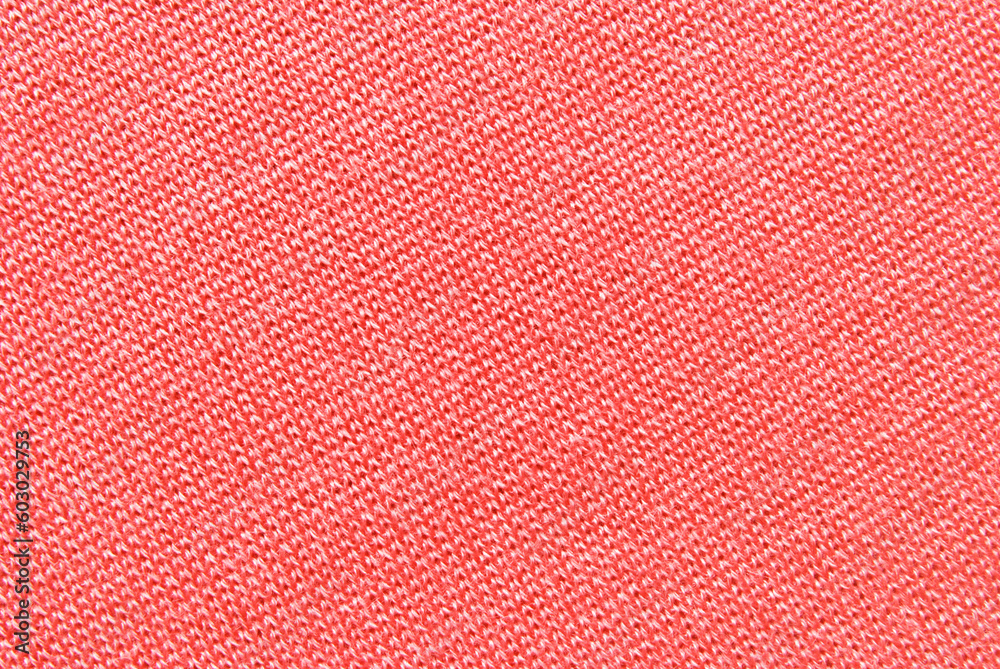 Jersey fabric texture, a surface of pink color jersey fabric texture as