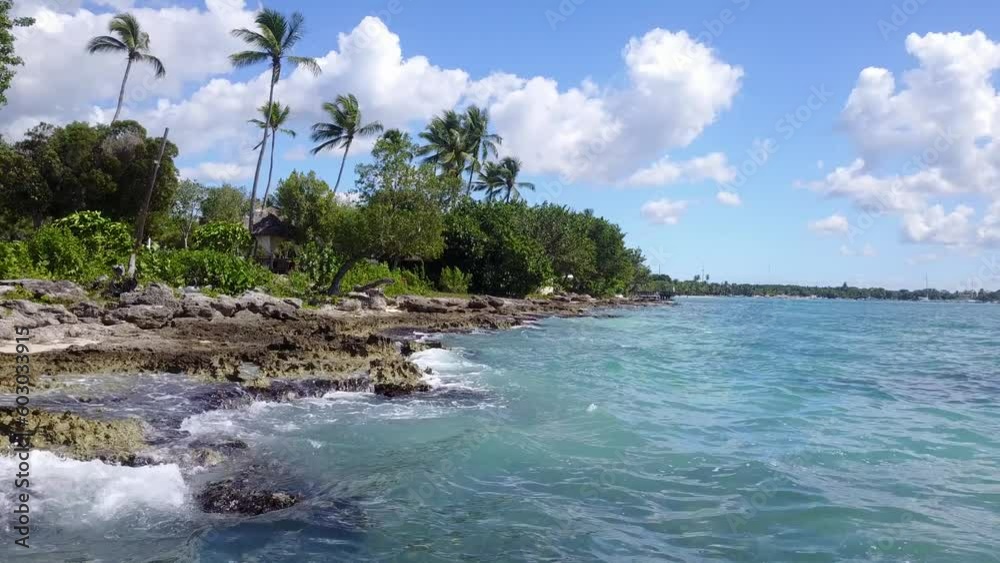Atlantic ocean and rock seachore in Domenican Republic. Blue sky. Beautiful ocean. Waves hits rock. Carribean Atlantic ocean and rock seachore in Domenican Republic. Blue sky. Beautiful ocean. Waves hits rock. Carribean