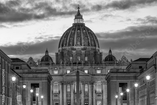 Black and white Saint Peter's Basilica in Vatican City and Ponte Vittorio Emanuele II bridge at night with moon. Rome Italy Europe