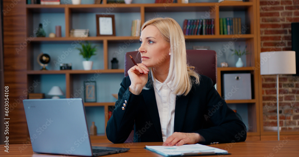 Blond serious doubtful smart senior middle aged old woman looking pensive or concerned, thinking of problems, solving business issues. looking for inspiration makes a decision feeling lack of ideas Blond serious doubtful smart senior middle aged old woman looking pensive or concerned, thinking of problems, solving business issues. looking for inspiration makes a decision feeling lack of ideas