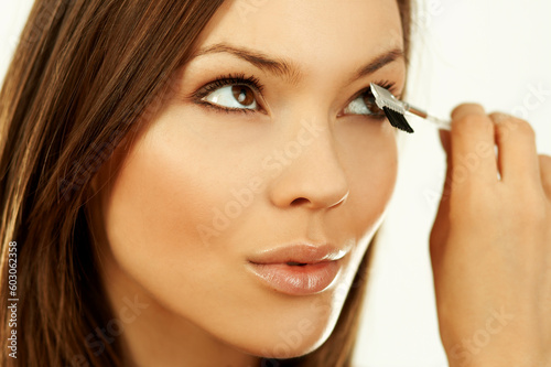 Portrait of Beautiful brunette woman doing daily morning routines