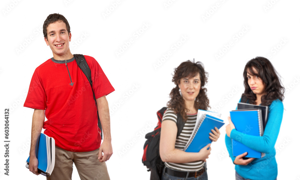 Three students with books and backpacks over a white background. Focus at front Three students with books and backpacks over a white background. Focus at front