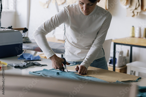 Seamstress dressmaking atelier production small business attire fabric photo