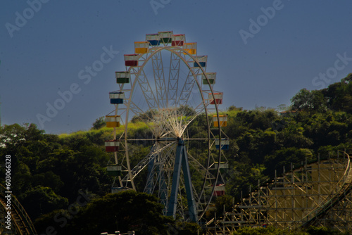 Hopi Hari park toys. Roller coaster and Ferris wheel at the amusement park.