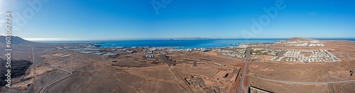 Drone panorama picture over Playa Blanca vacation village in Lanzarote © Aquarius