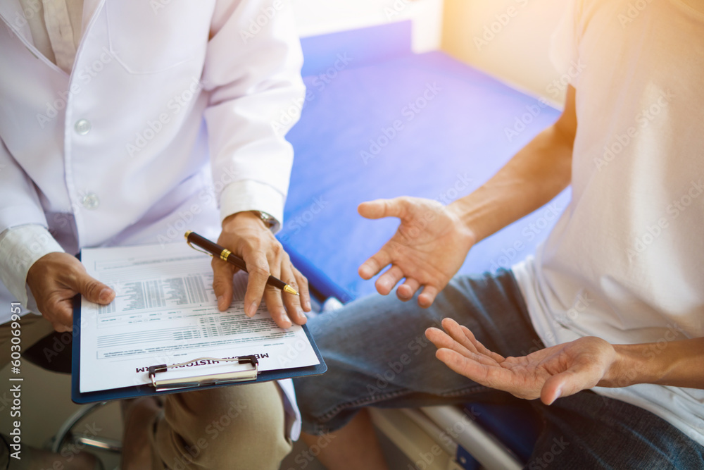 doctor is having consultation discussing prostate cancer and venereal cancer detected in young man. Current doctors provide advice and counseling on detecting prostate cancer and treating it properly. doctor is having consultation discussing prostate cancer and venereal cancer detected in young man. Current doctors provide advice and counseling on detecting prostate cancer and treating it properly.