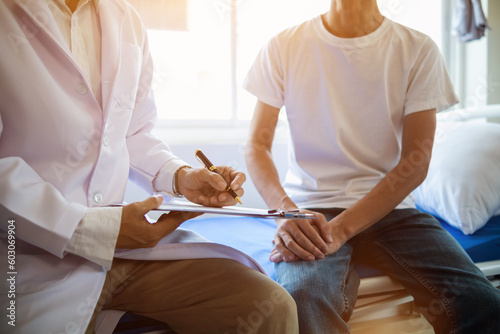 doctor is having consultation discussing prostate cancer and venereal cancer detected in young man. Current doctors provide advice and counseling on detecting prostate cancer and treating it properly.
