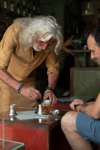 Preparing tea for a customer photo